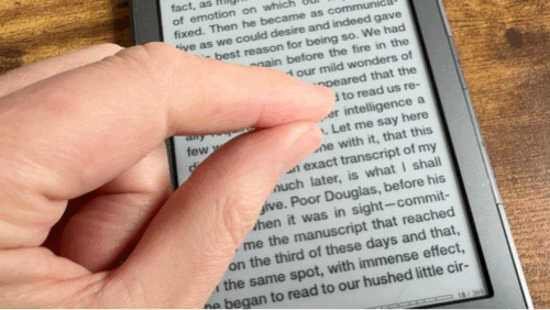 Turning the pages of a book on a Kindle by tapping and doubling tapping using an Apple Watch.