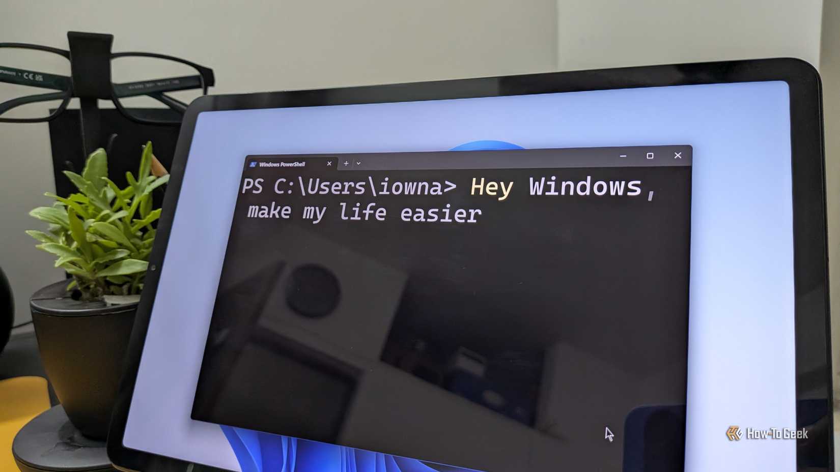 Windows running on a tablet with the PowerShell open and a command asking Windows to make the user's life easier.