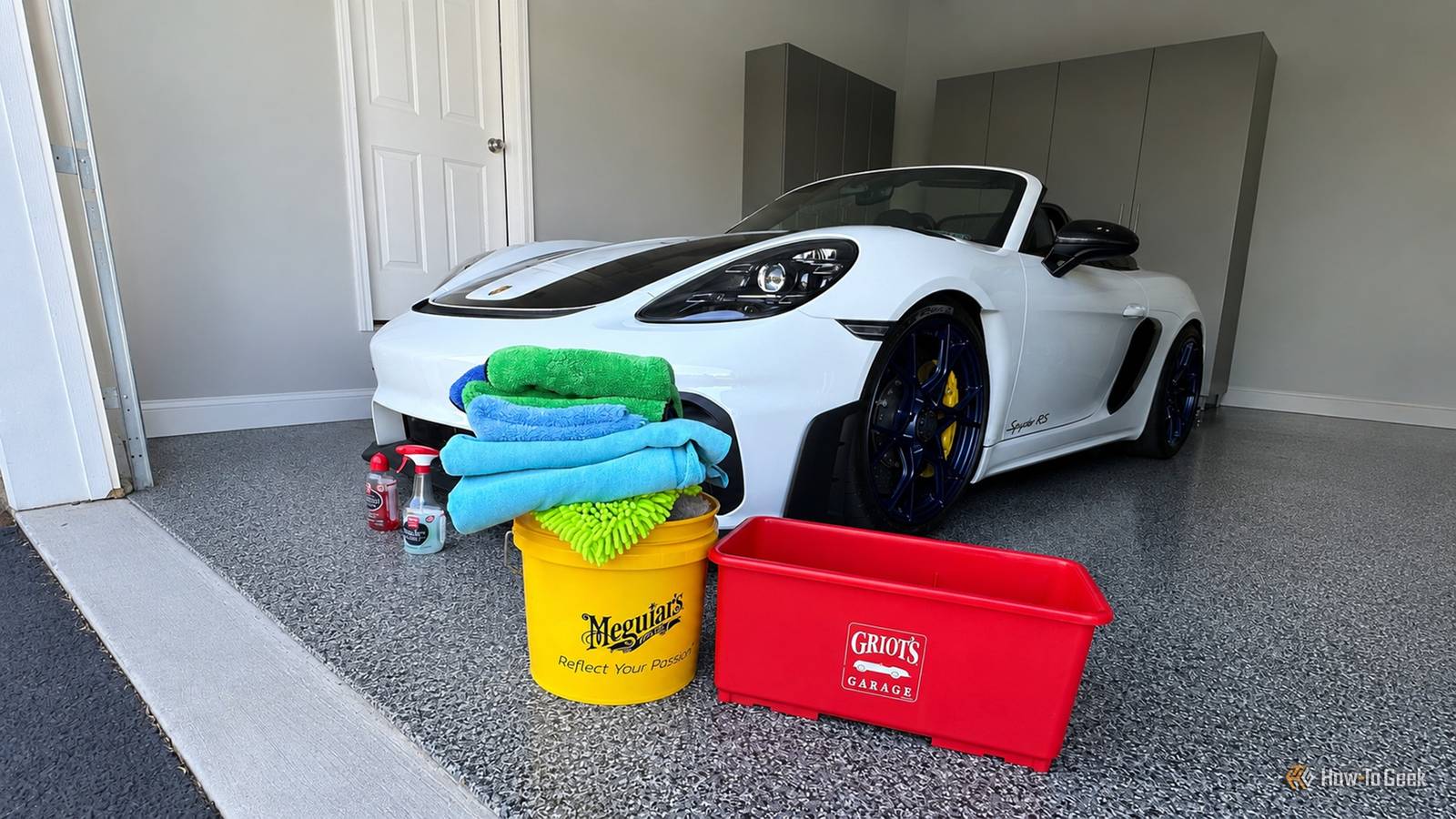 Spyder RS in garage with wash supplies