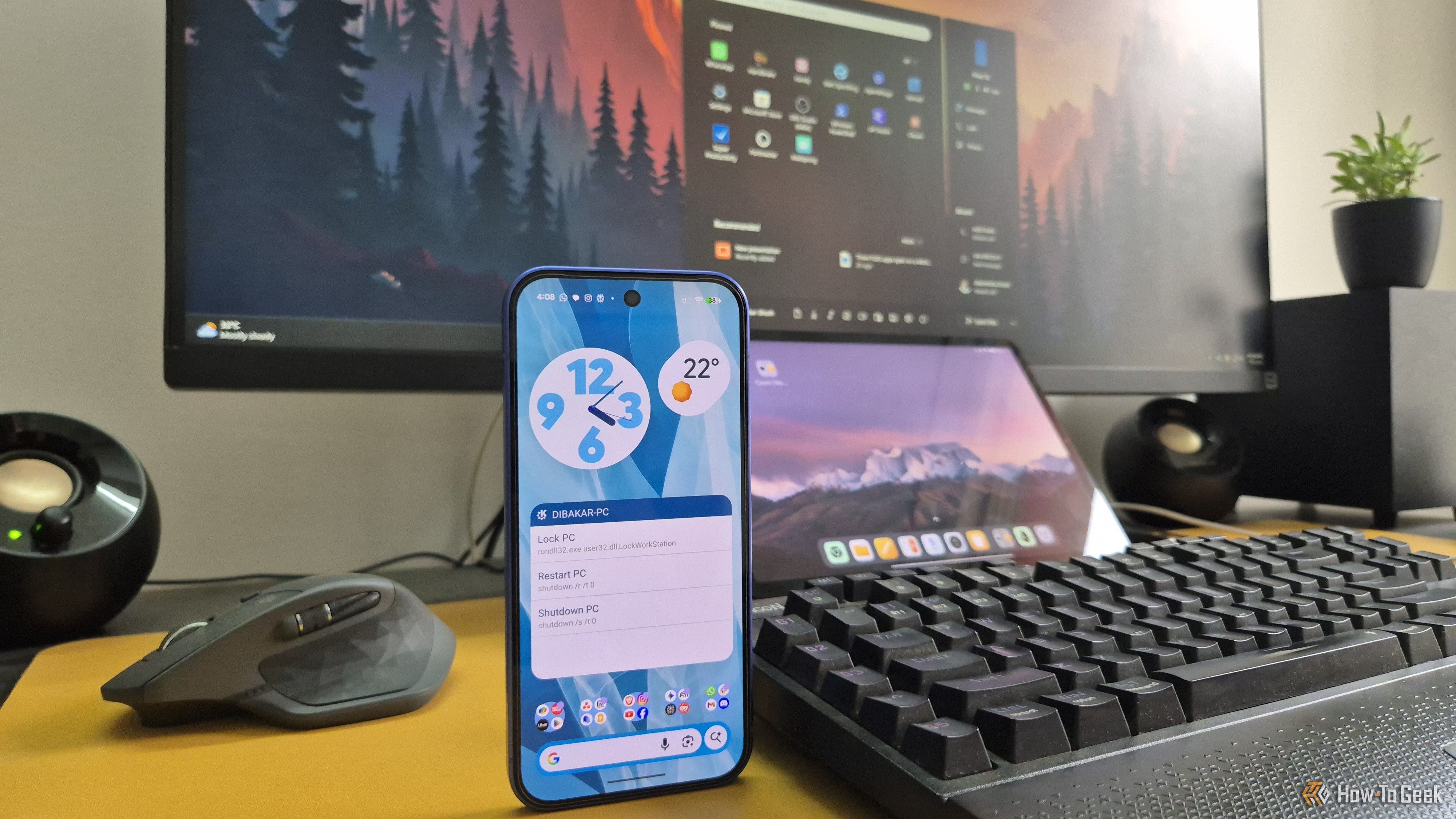 A Pixel, Mi Pad 5, and Windows PC on a desk.-1