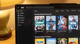 The Plex homepage open showing Marvel movies in 4K and other movies on a laptop screen.