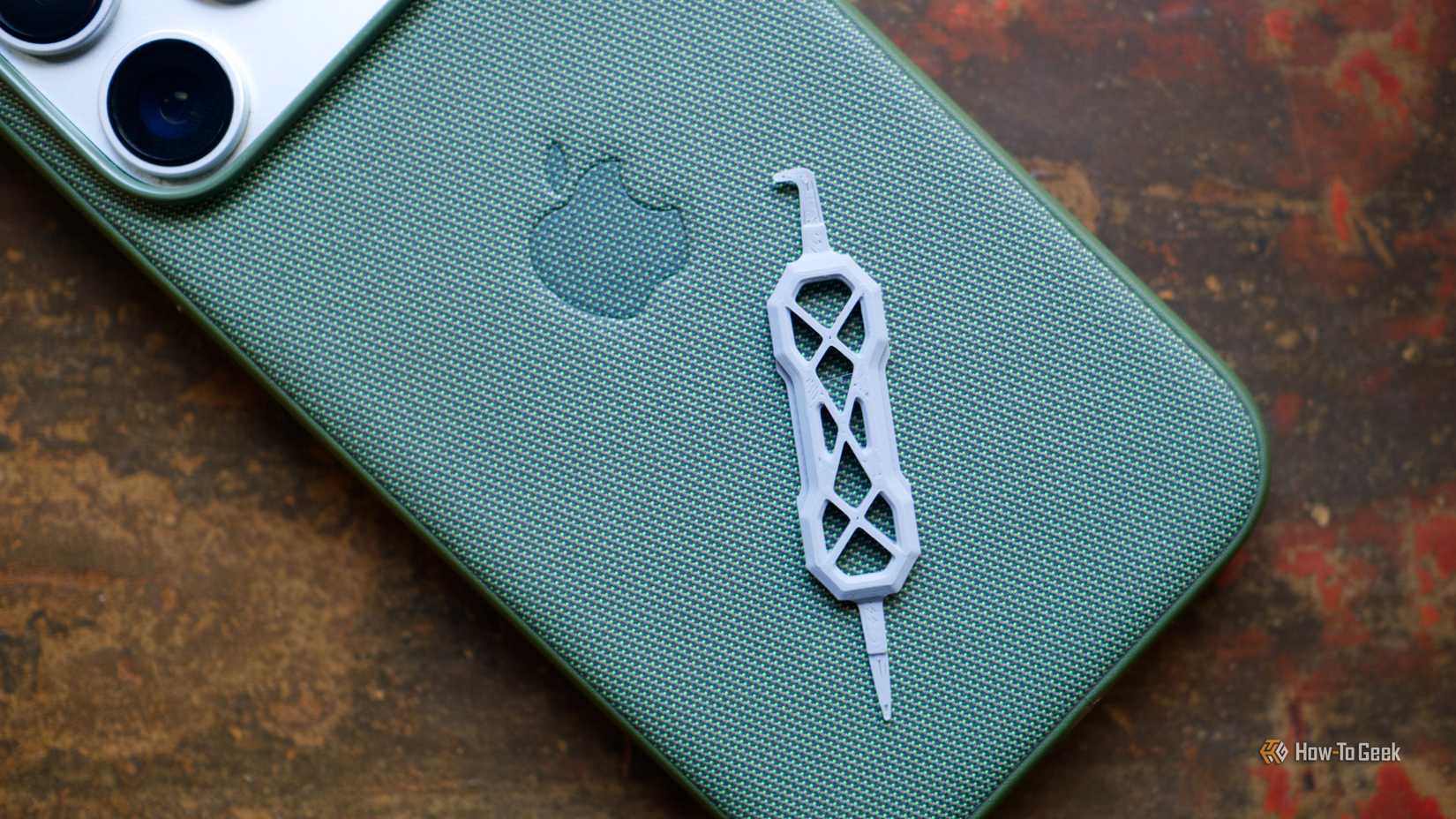 Charging port cleaner on an iPhone.