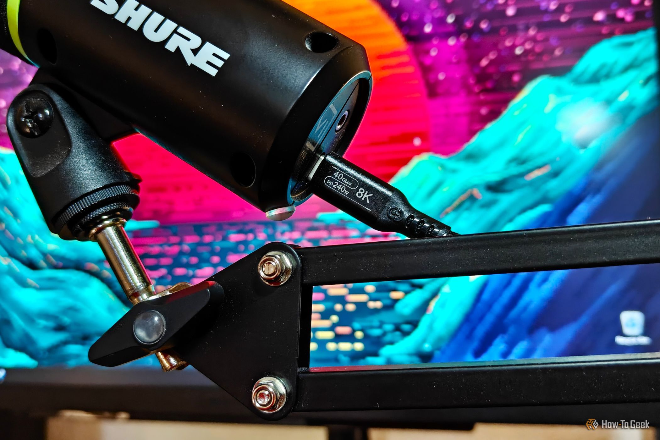 A USB4 cable plugged into a microphone.