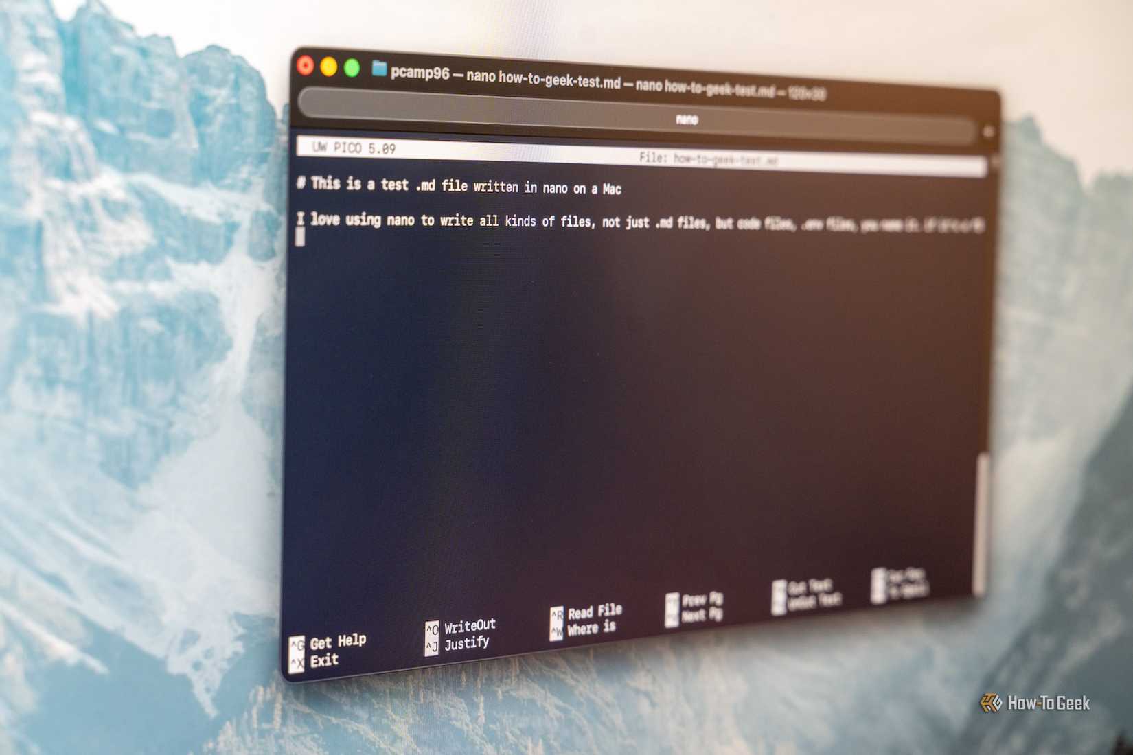 nano text editor open in macOS Terminal close angled photo.
