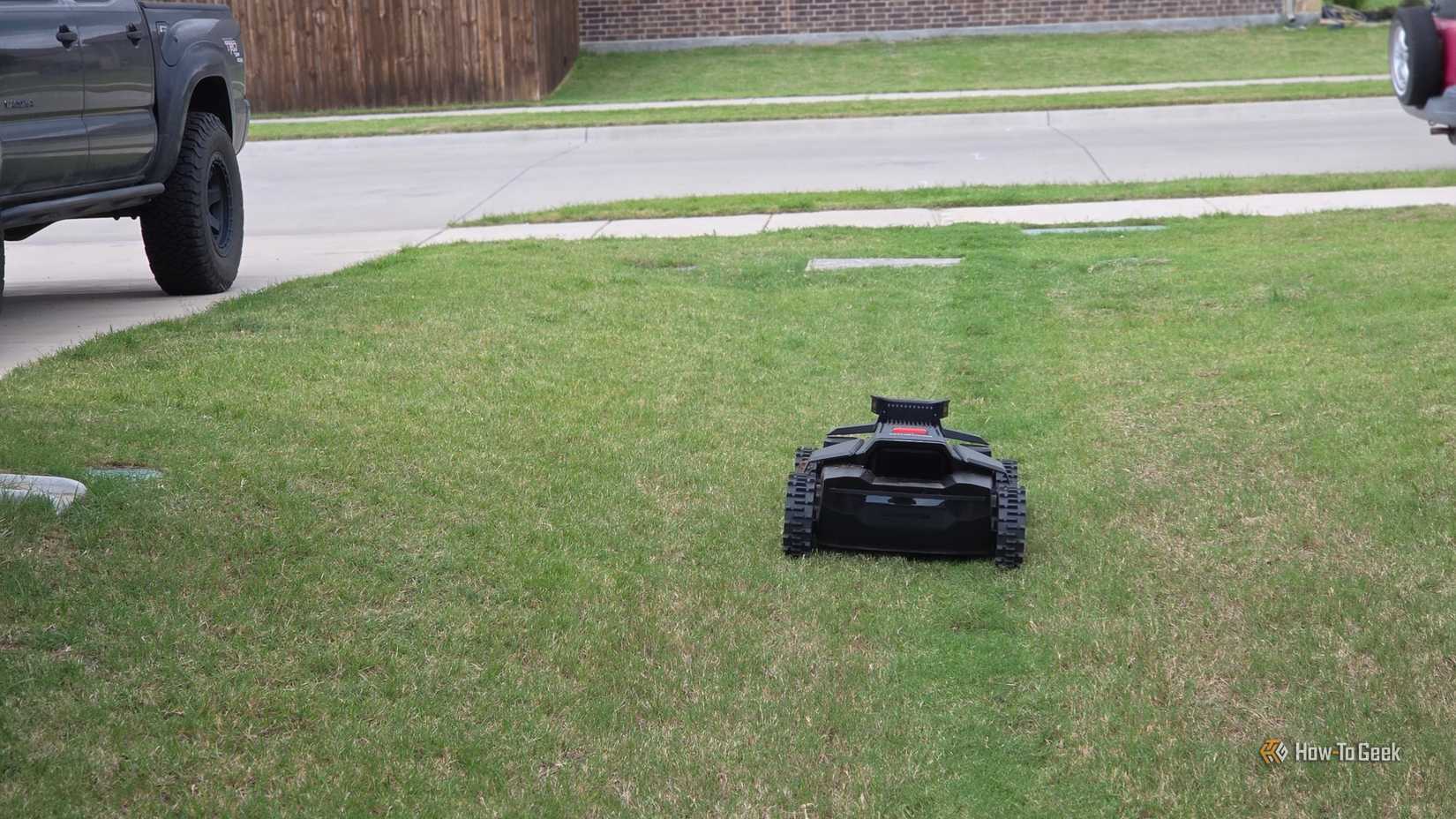 Navimow mowing the side yard