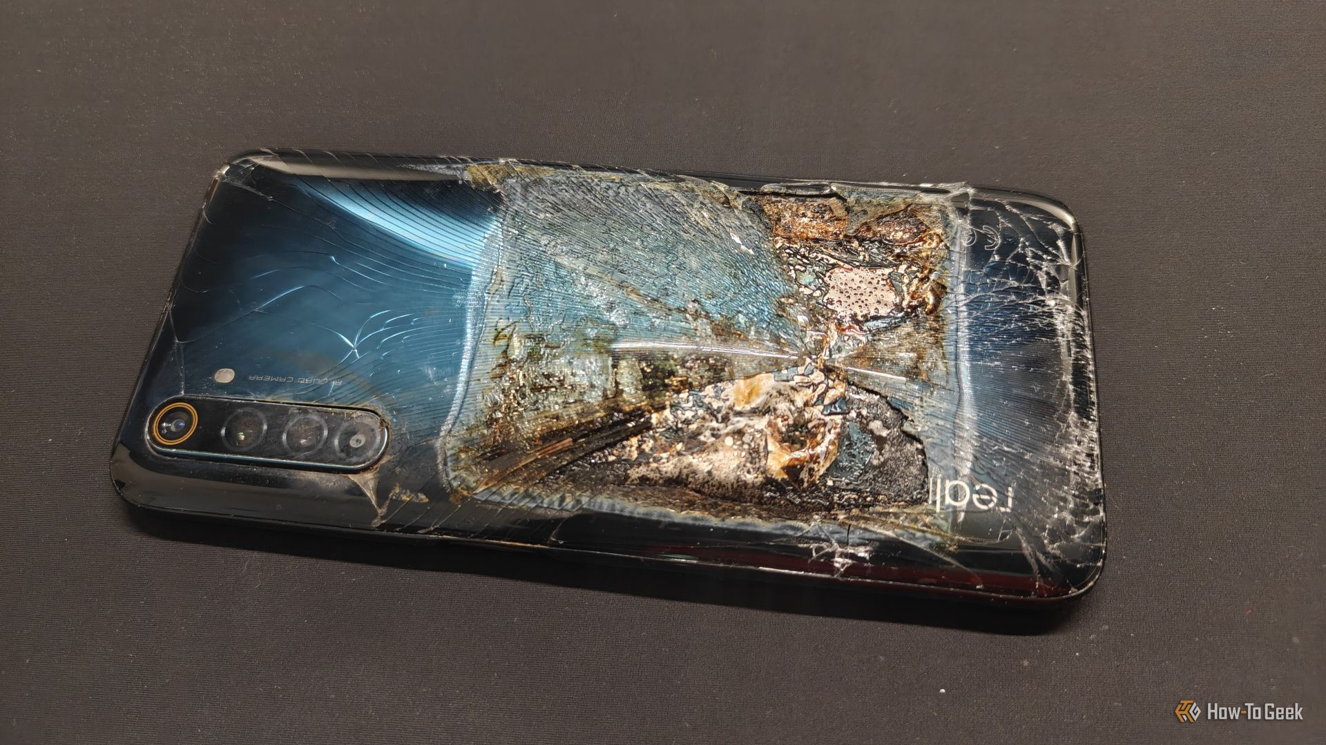 A Realme 6 Pro Android phone with a burned battery.