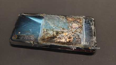 A Realme 6 Pro Android phone with a burned battery.