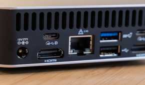 Rear I-O left side with 19V DC power USB-C 40Gbps DisplayPort HDMI 2.5G Ethernet and USB-A 10Gbps.