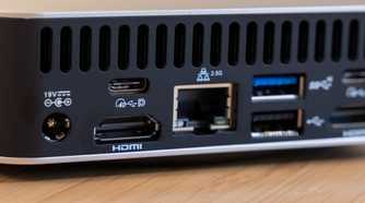 Rear I-O left side with 19V DC power USB-C 40Gbps DisplayPort HDMI 2.5G Ethernet and USB-A 10Gbps.