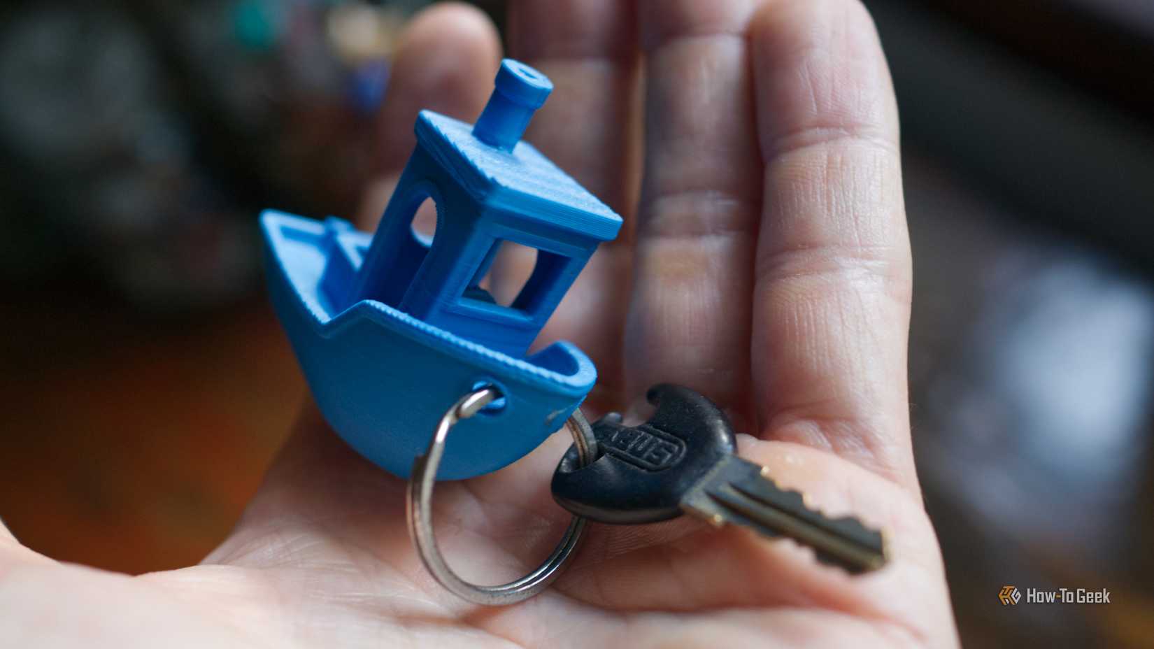 The Benchy keyring in hand.