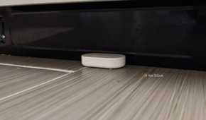 An IKEA KLIPPBOK water sensor underneath a dishwasher.