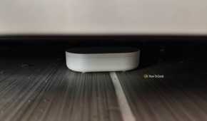 An IKEA KLIPPBOK water sensor underneath a refrigerator.
