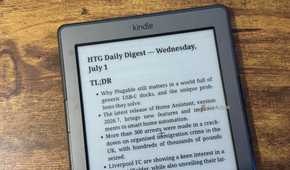 A close up of a Kindle 4 showing the HTG Daily Digest TLDR bullet list covering Plugable Home Assistant immigration crime and Liverpool FC.