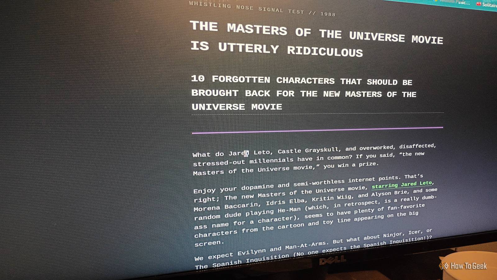 A computer monitor showing a website with a white text and a black background.