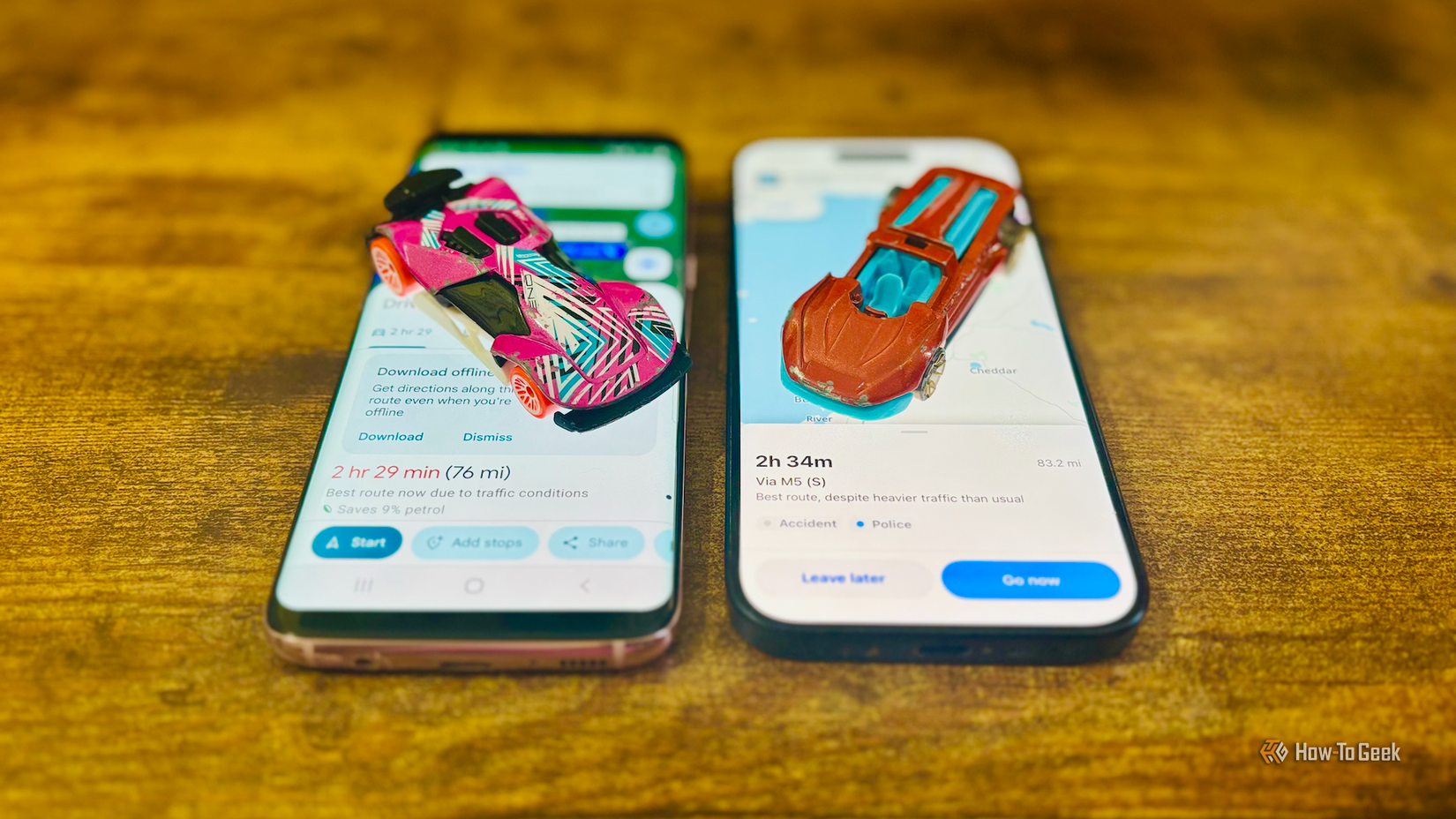 A Samsung Galaxy S8 running Google Maps and an iPhone 15 Pro running Wave with the same journey on each, and a Hot Wheels car sitting on top of each phone.