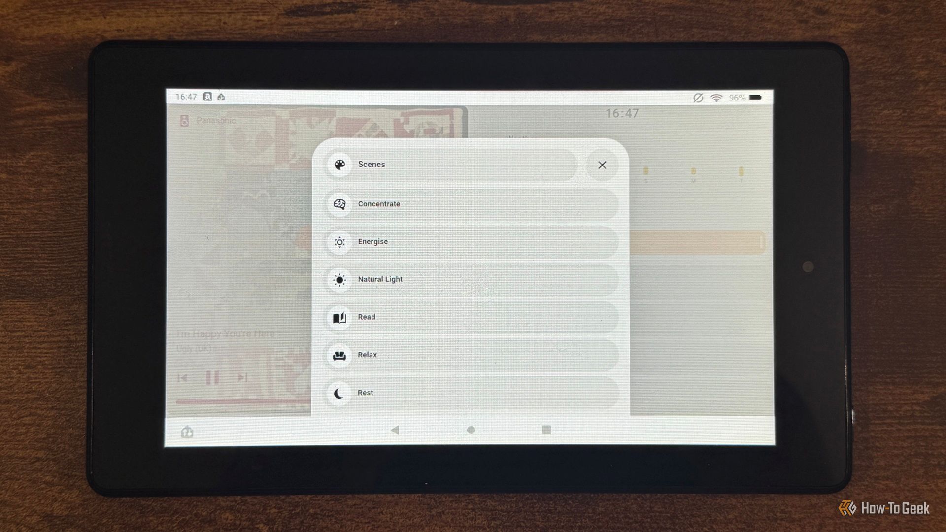 A tablet showing the Home Assistant Scenes list with Concentrate Energise Natural Light Read Relax and Rest.
