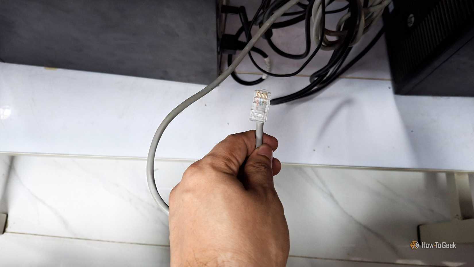 An Ethernet cable ready to be plugged in.
