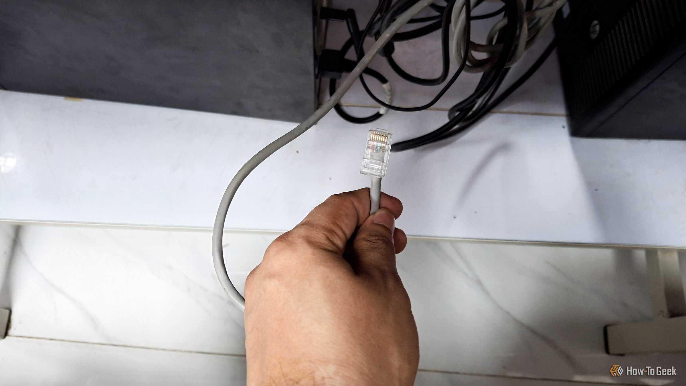 An Ethernet cable ready to be plugged in.