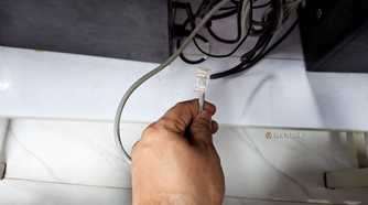 An Ethernet cable ready to be plugged in.
