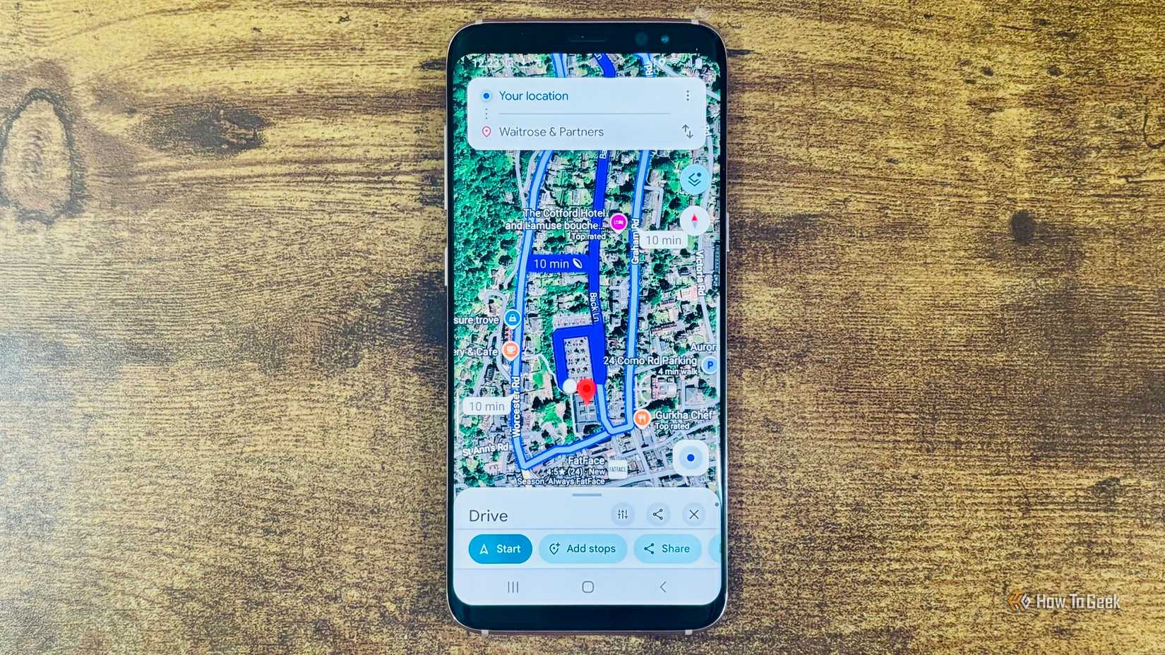 Android Google Maps close up showing a 10 minute route to Waitrose and Partners with Drive Start Add stops and Share buttons.