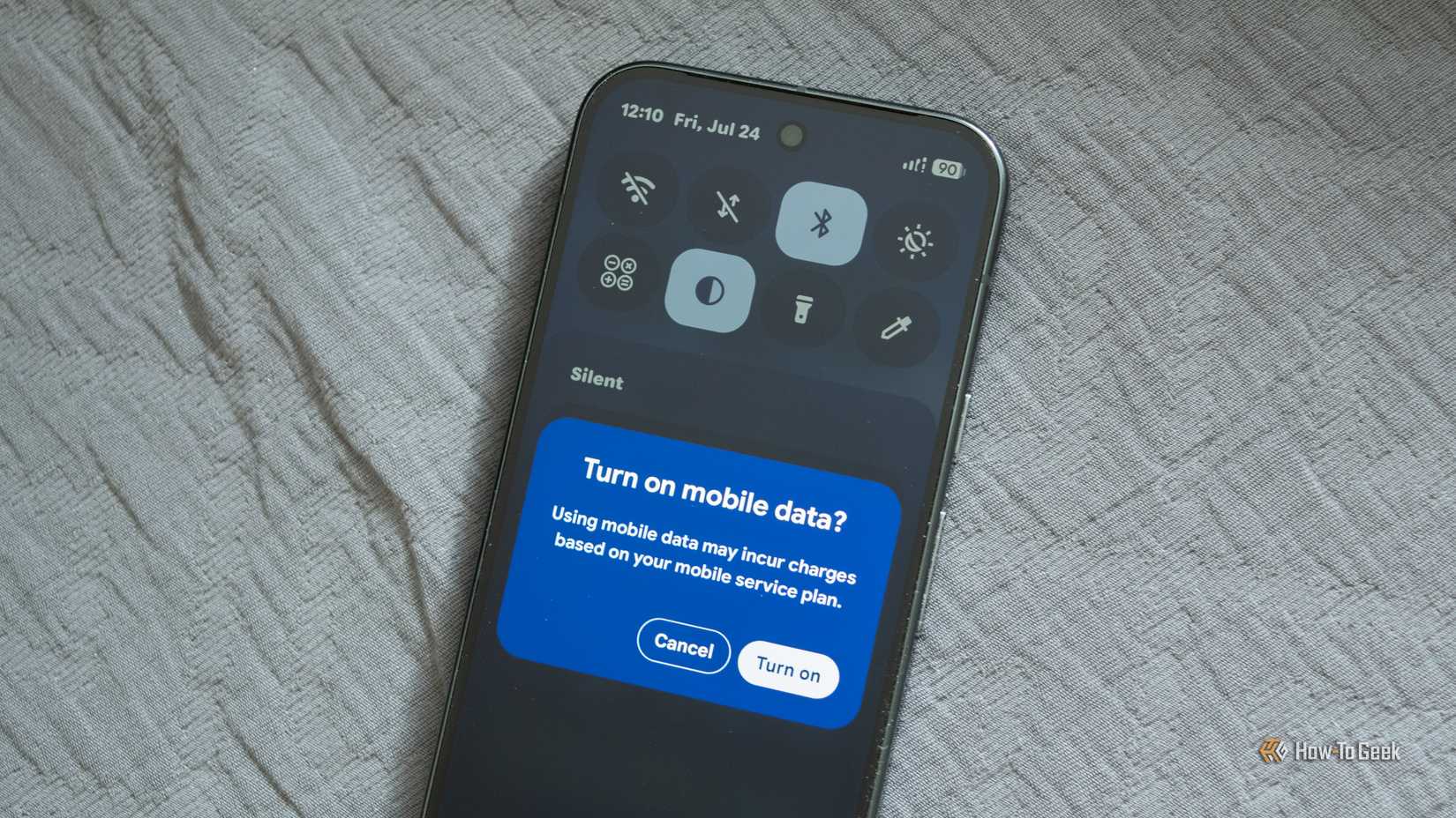 A warning about mobile data charges when you try to enable mobile data on a Google Pixel 10 Pro. 