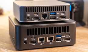 GEEKOM IT13 Max mini PC rear port and size comparison with smaller GEEKOM mini PC.