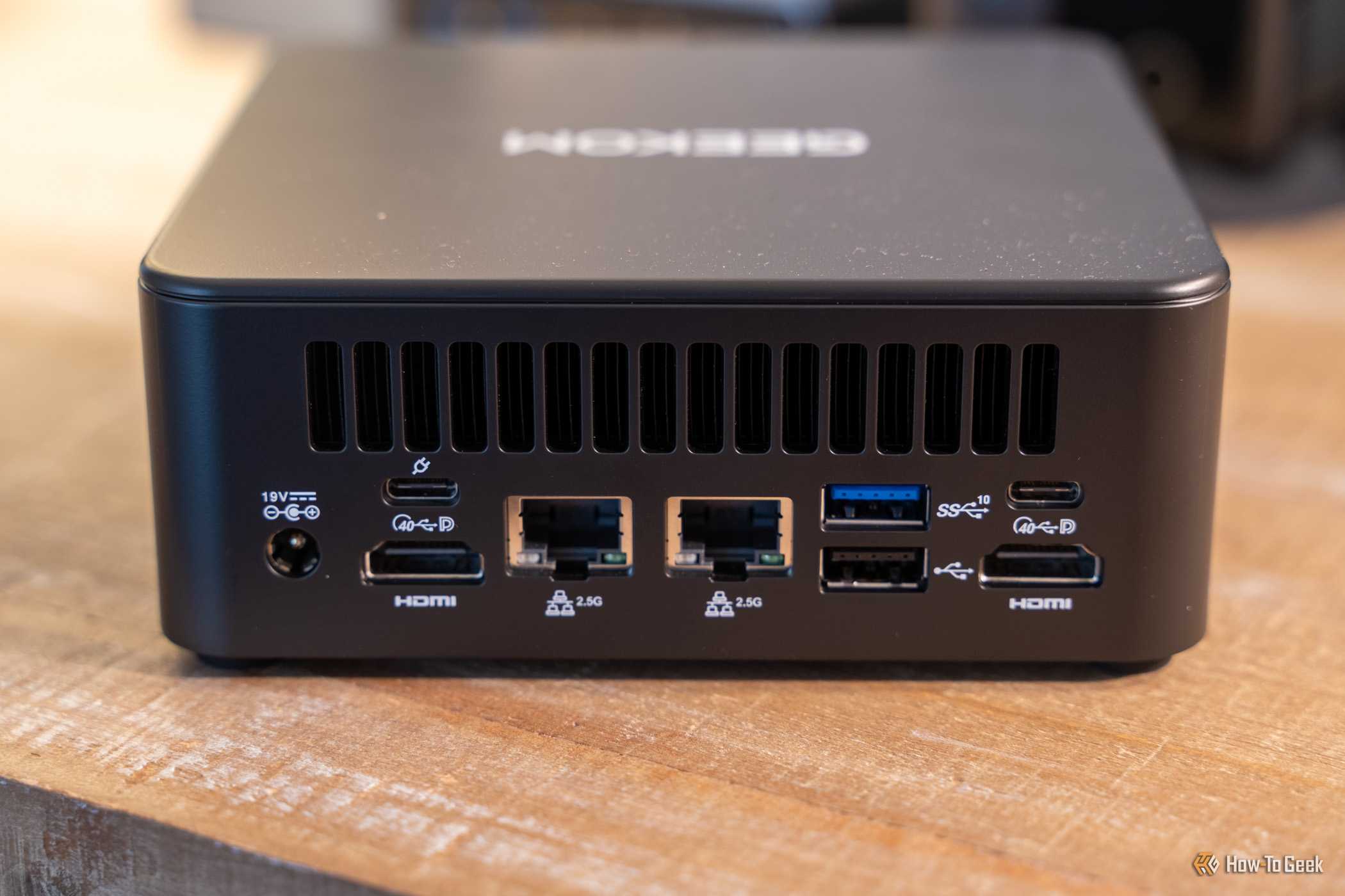 GEEKOM IT13 Max mini PC rear ports with USB-C PD input dual Ethernet and HDMI.