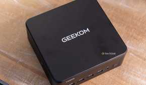 GEEKOM IT13 Max mini PC top and front ports with GEEKOM logo.