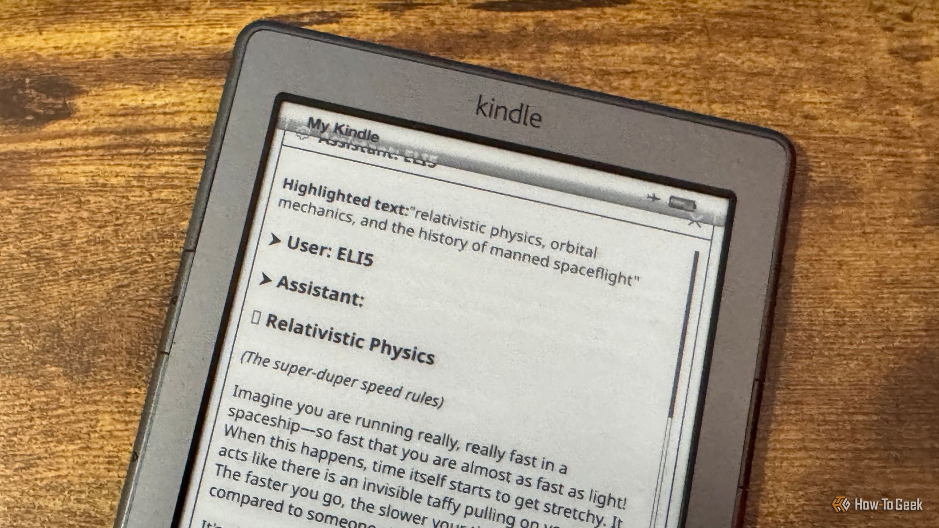 Kindle AI Assistant showing the highlighted text field for relativistic physics orbital mechanics and the history of manned spaceflight.