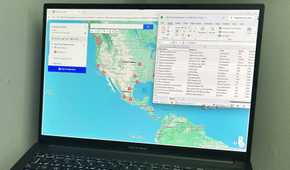 Laptop screen showing Google My Maps and Microsoft Excel, both with World Cup Stadium information displayed.
