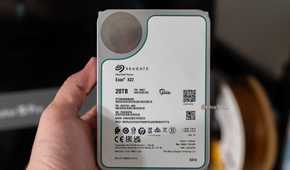 Seagate Exos X22 20TB recertified SATA hard drive held in hand.