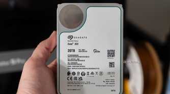 Seagate Exos X22 20TB recertified SATA hard drive held in hand.