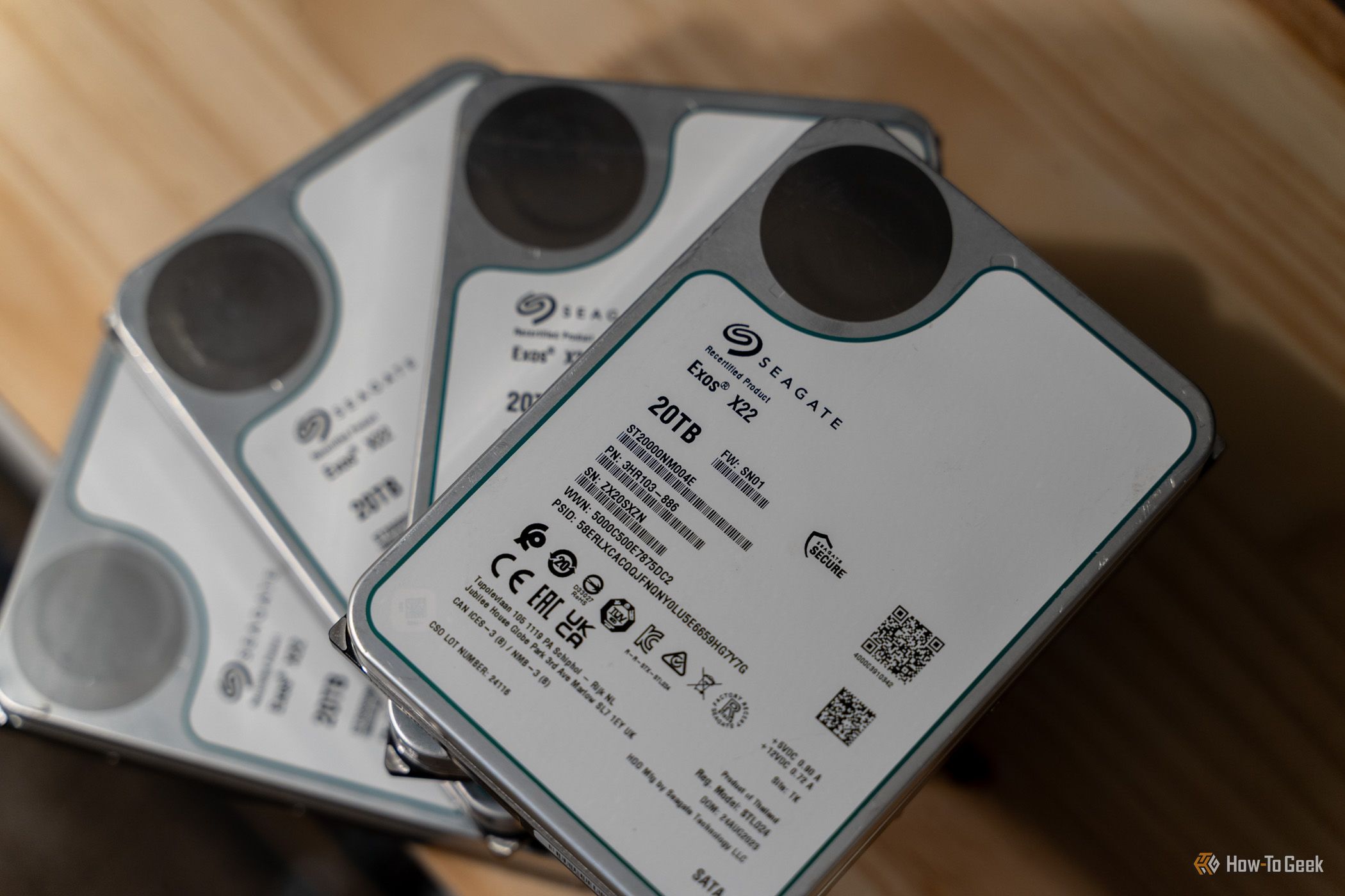 Seagate Exos X22 20TB recertified SATA hard drives stacked close-up.