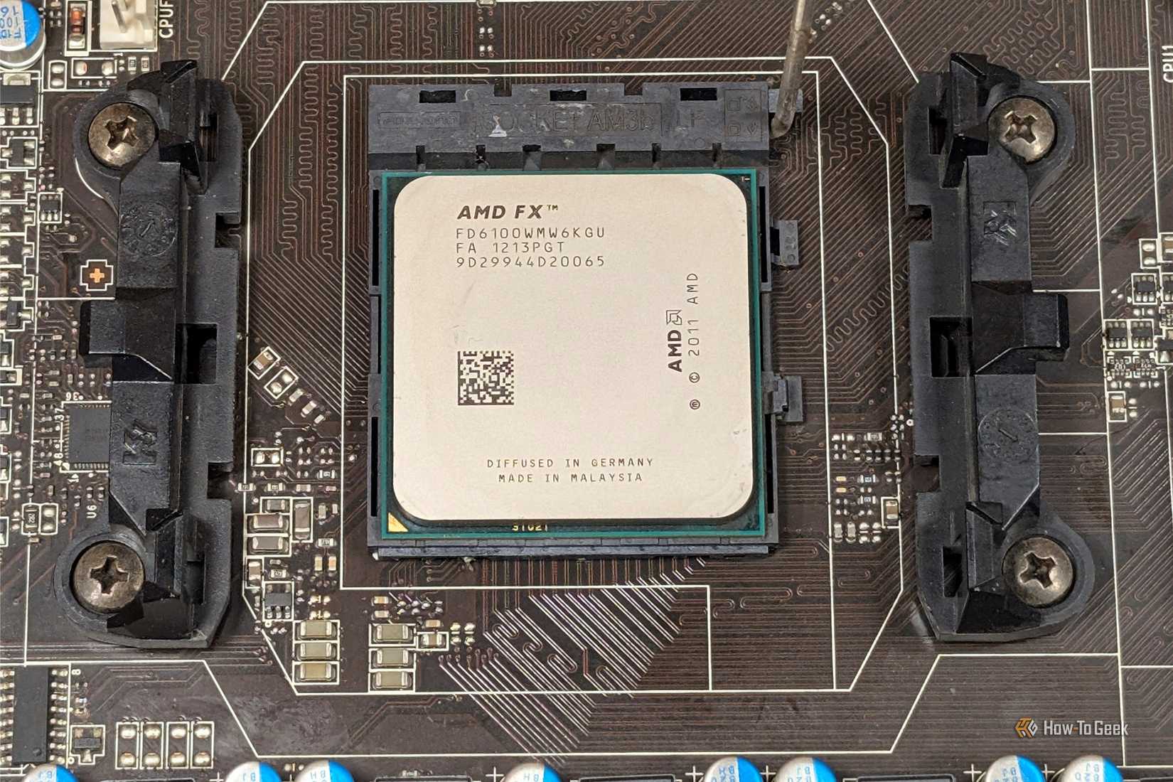 A top-down view of an FX-6100 "Bulldozer" CPU. 
