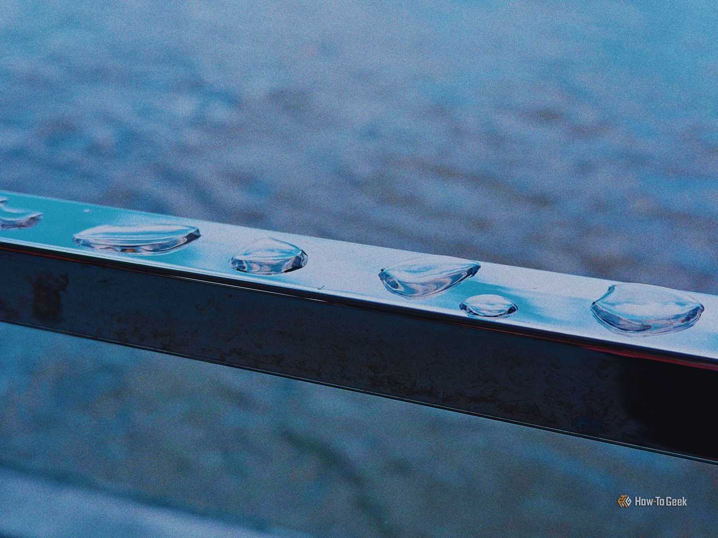 Water droplets on a railing processed with Spektrafilm.