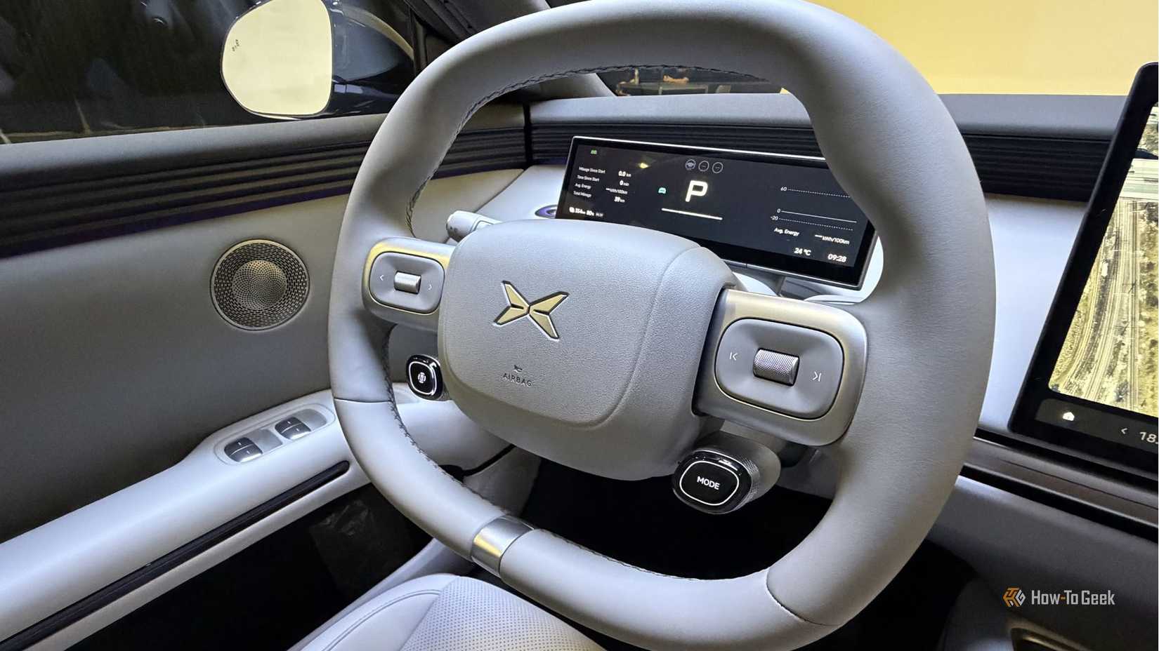 Close-up shot of the steering wheel of an XPENG L03.
