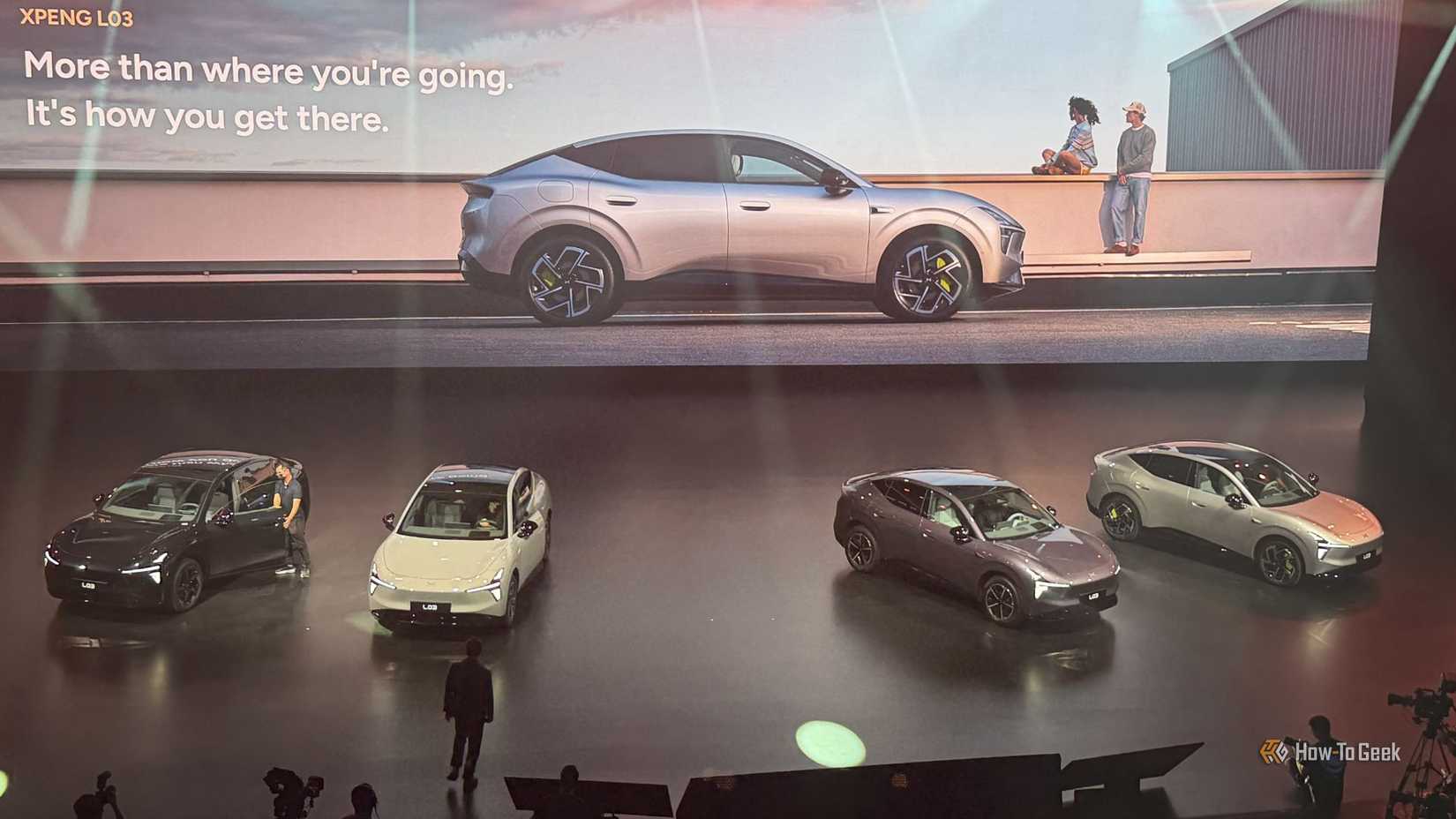 Shot of four XPENG L03 vehicles on stage at the global debut in Munich.
