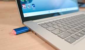 USB thumb drive plugged into a Surface Laptop.