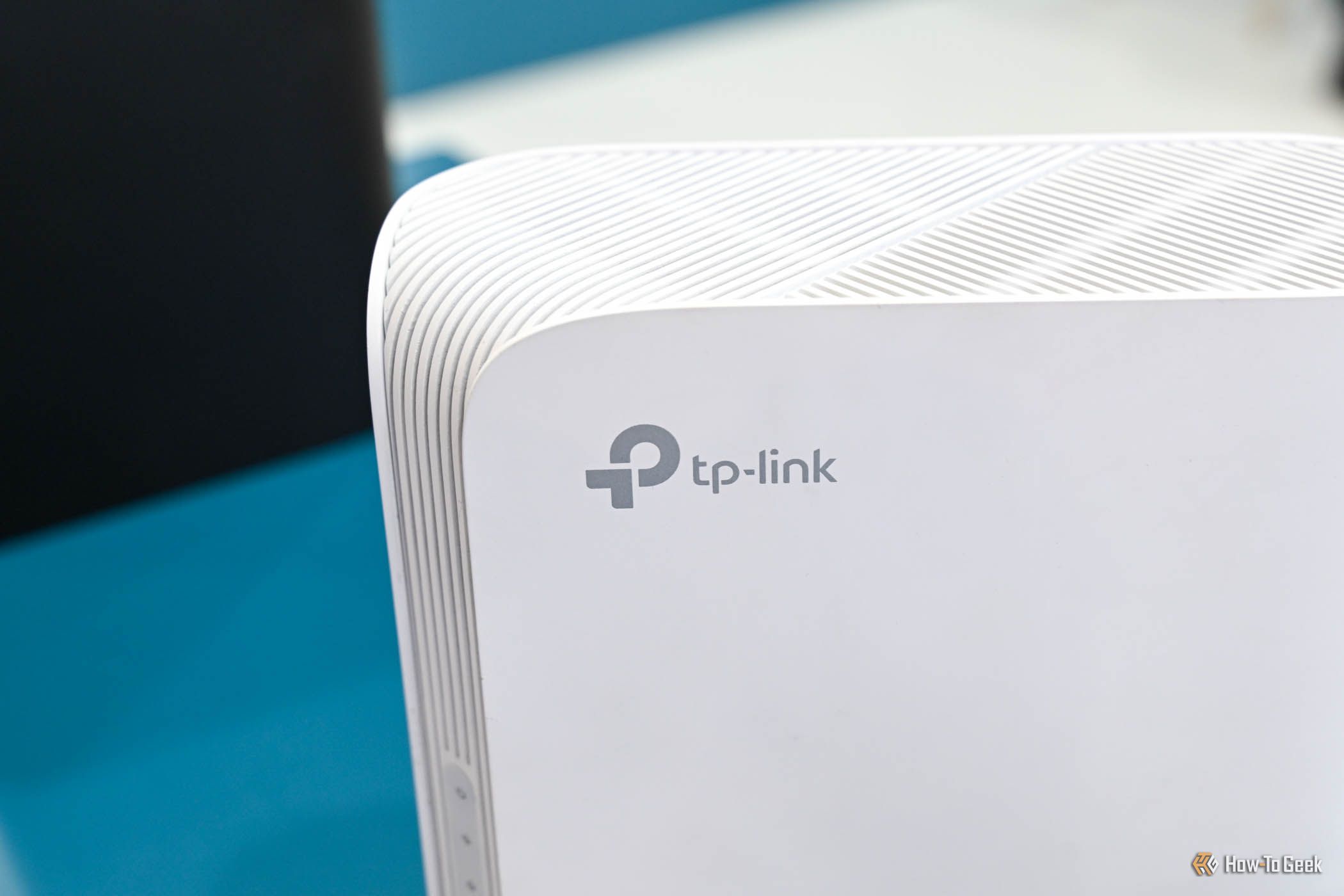 TP Link logo on the BE7200 Dual Band WiFi 7 XGS PON VoIP Router.