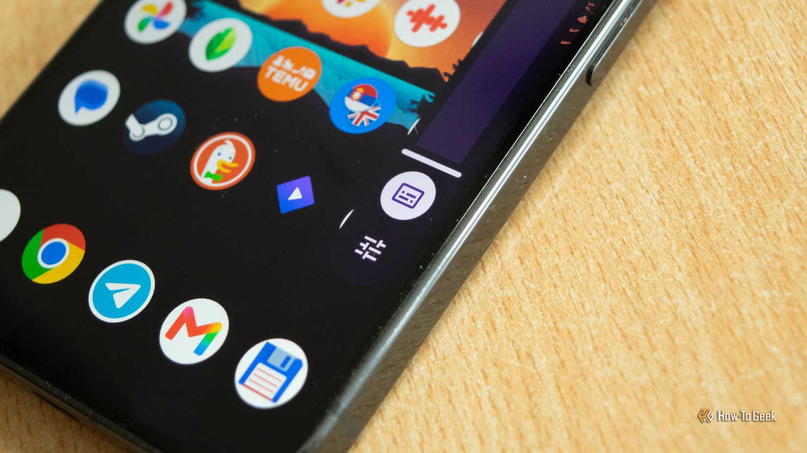 A Home screen page on a Pixel 10 Pro showing the Live Caption toggle