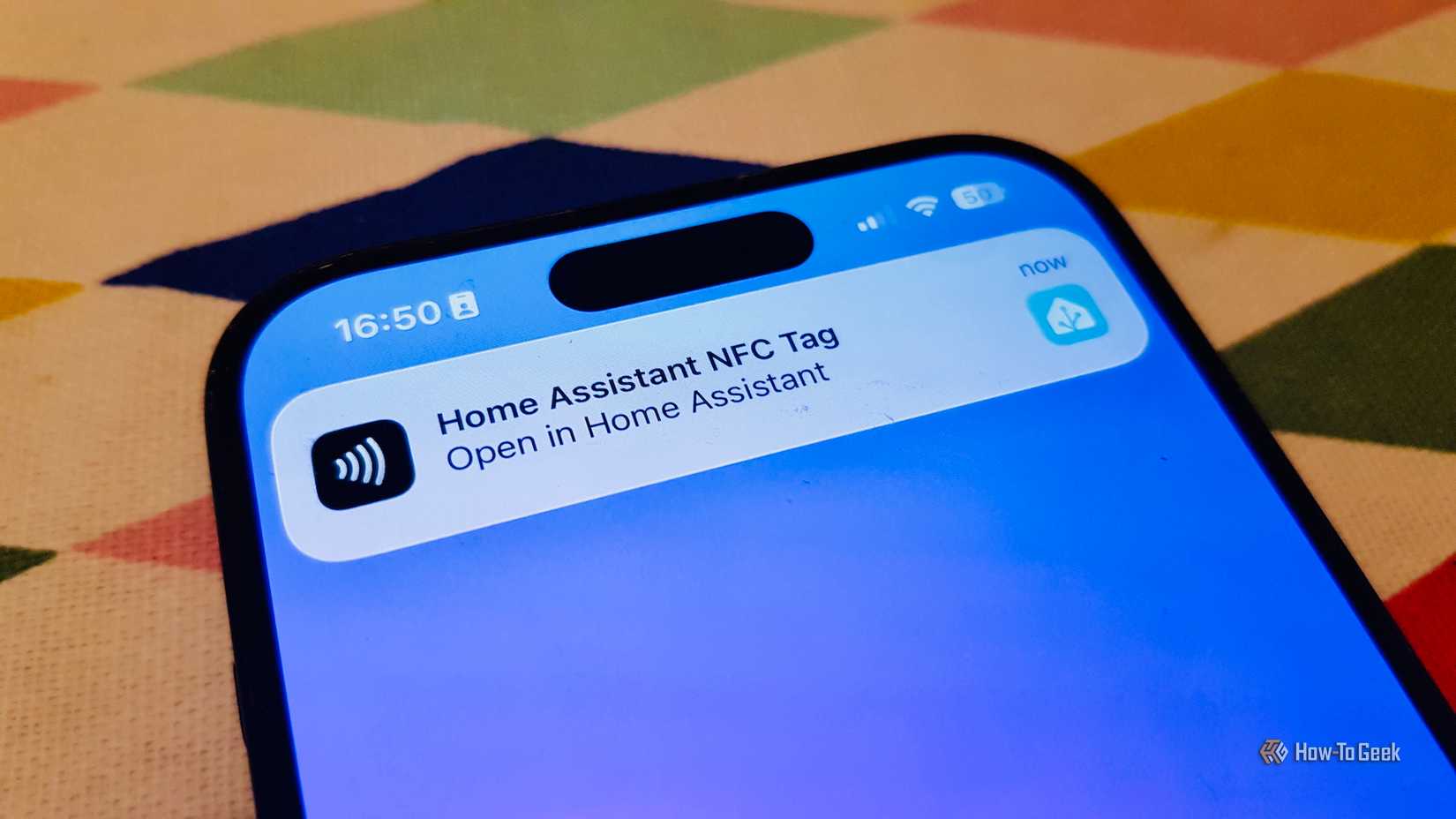A notification on an iPhone asking permission to open an automation in Home Assistant after scanning an NFC tag.