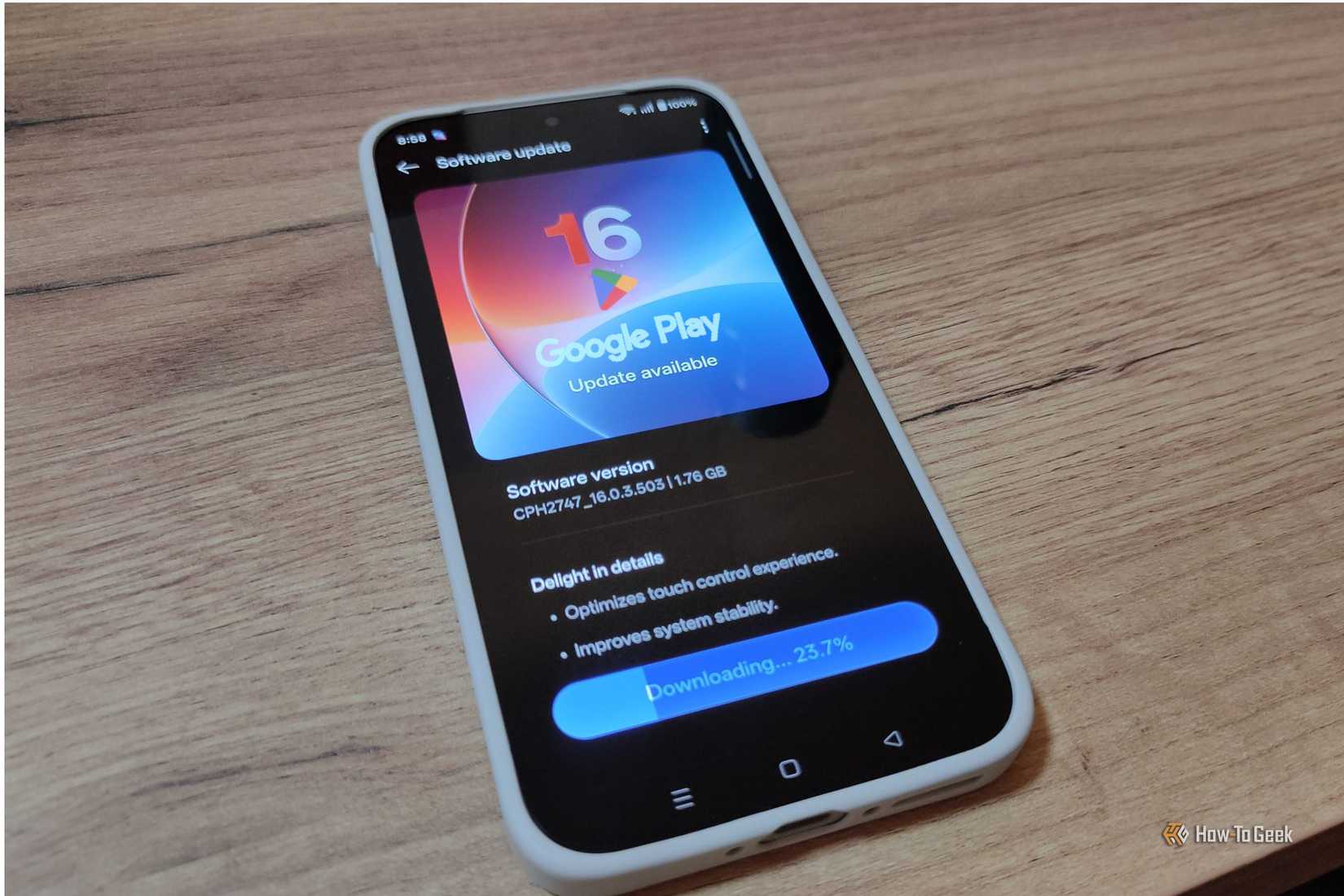 A phone with a custom Google Play update being installed.