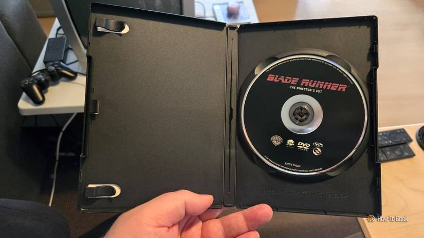 An open DVD case containing the 1992 Blade Runner Director's Cut.