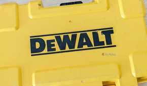 DeWALT logo on a yellow tool box