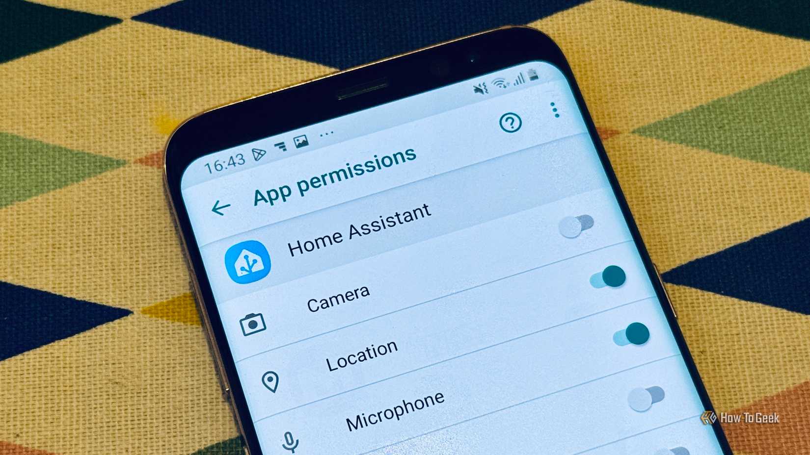Home Assistant app permissions screen on Android listing Camera Location and Microphone toggles.