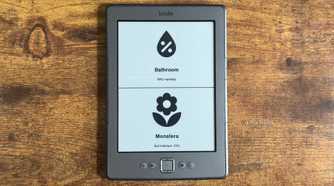 Kindle Eink display showing a Home Assistant dashboard with Bathroom humidity at 68 percent and Monstera soil moisture at 23 percent.