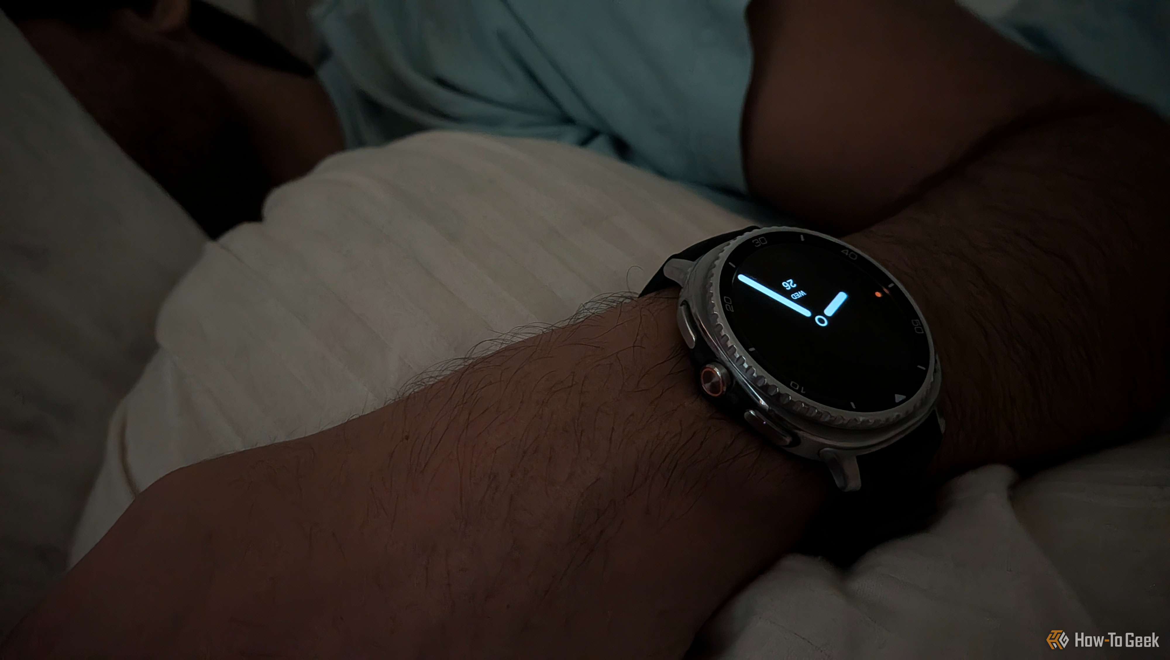 Me sleeping while wearing a Galaxy Watch 8 Classic with a minimal watch face.