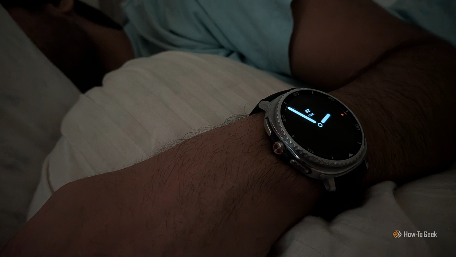 Me sleeping while wearing a Galaxy Watch 8 Classic with a minimal watch face.