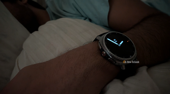 Me sleeping while wearing a Galaxy Watch 8 Classic with a minimal watch face.