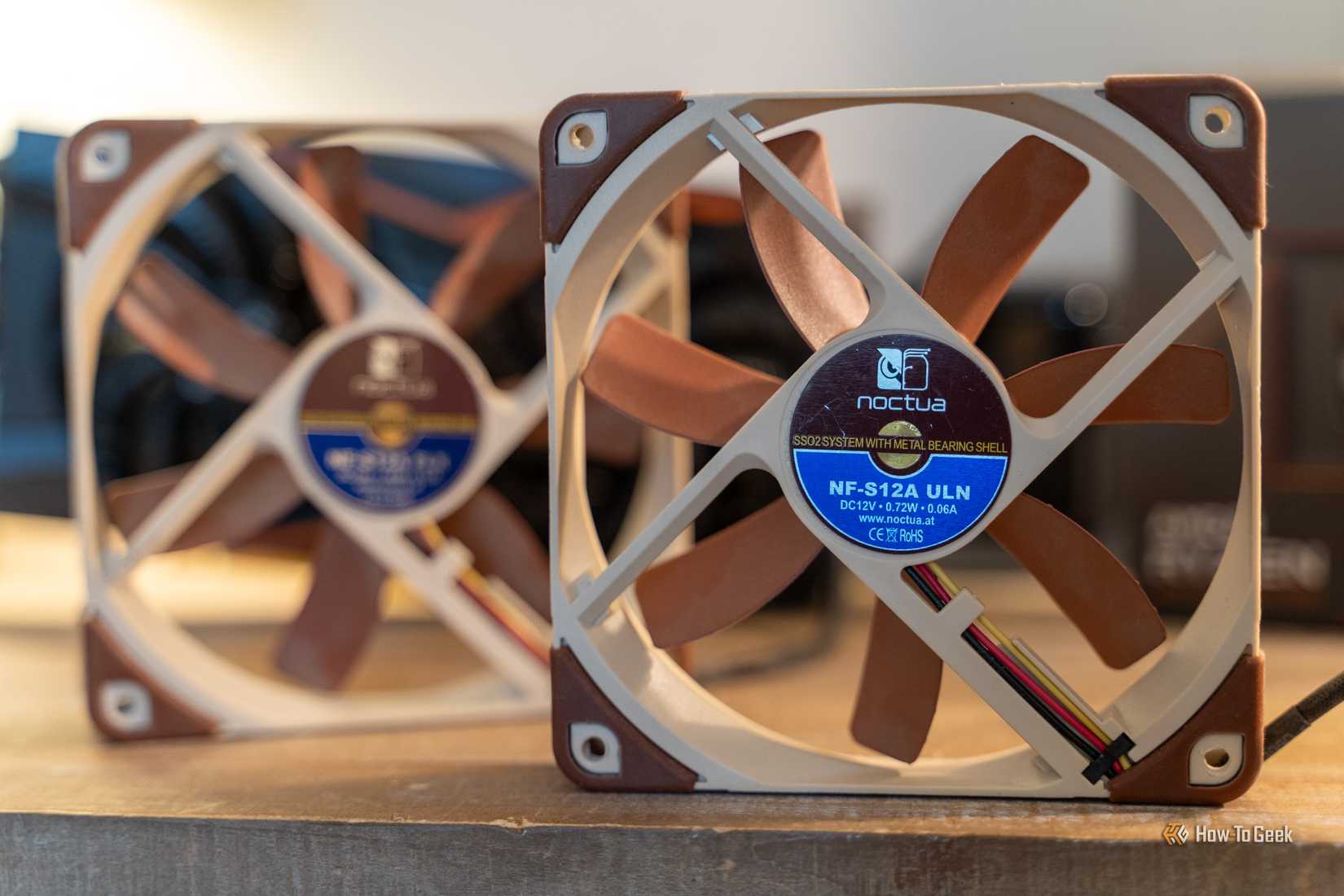 Noctua NF-S12A ULN 120 mm fans with foreground fan in focus.